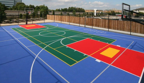 A basketball court located in Florida with a blue and red surface.